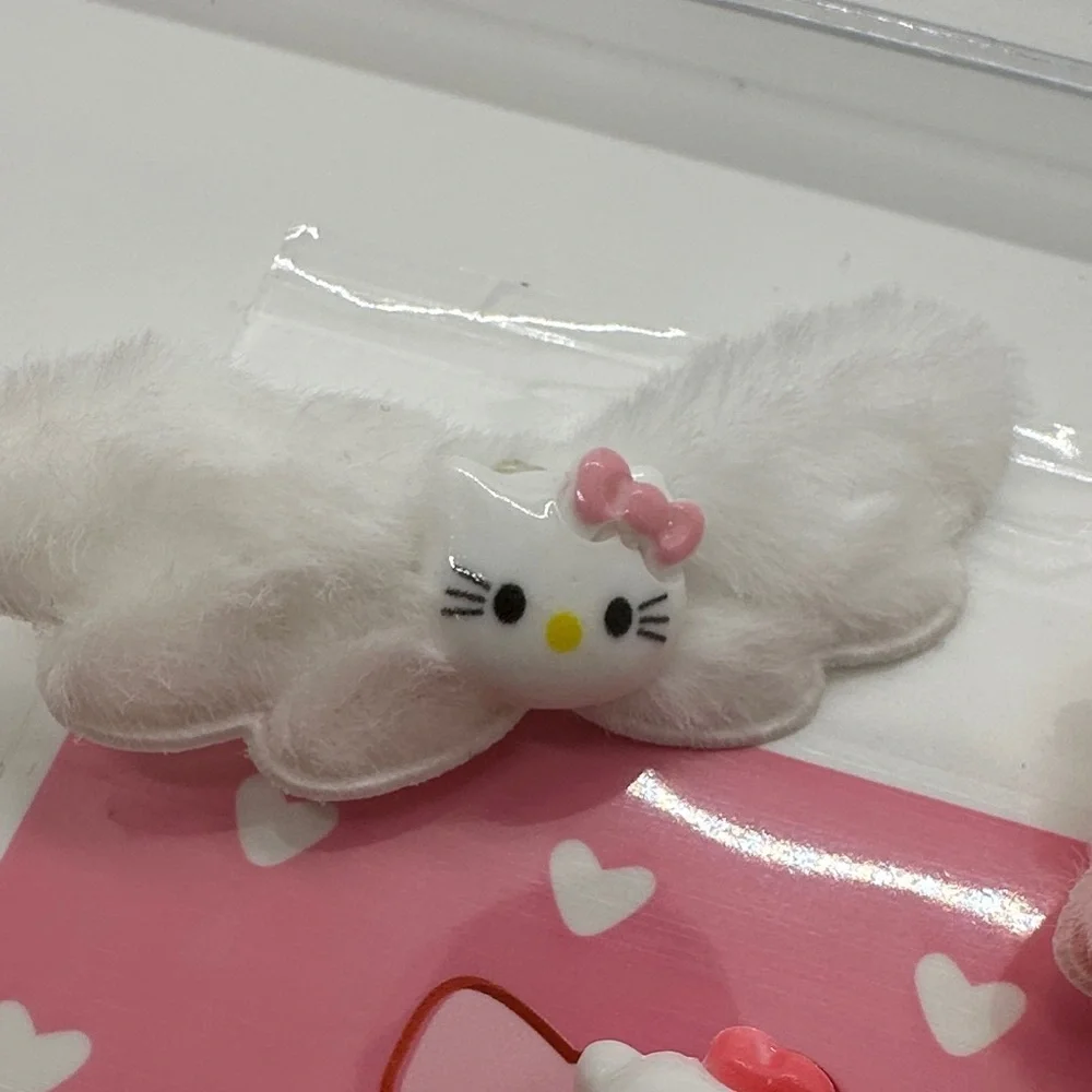3/$15 🌼 Hello Kitty Pink and White Hair Clips Set